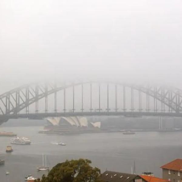 Sydney Harbour Bridge covered in haze