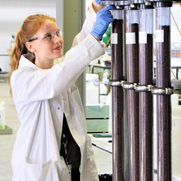 Staff from ANSTO at minerals processing equipment