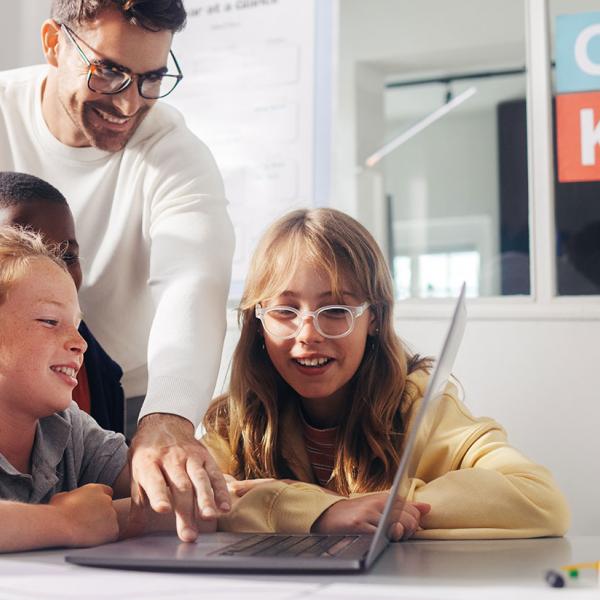 students on a laptop