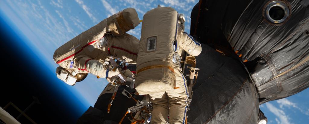 Astronauts outside International Space Station