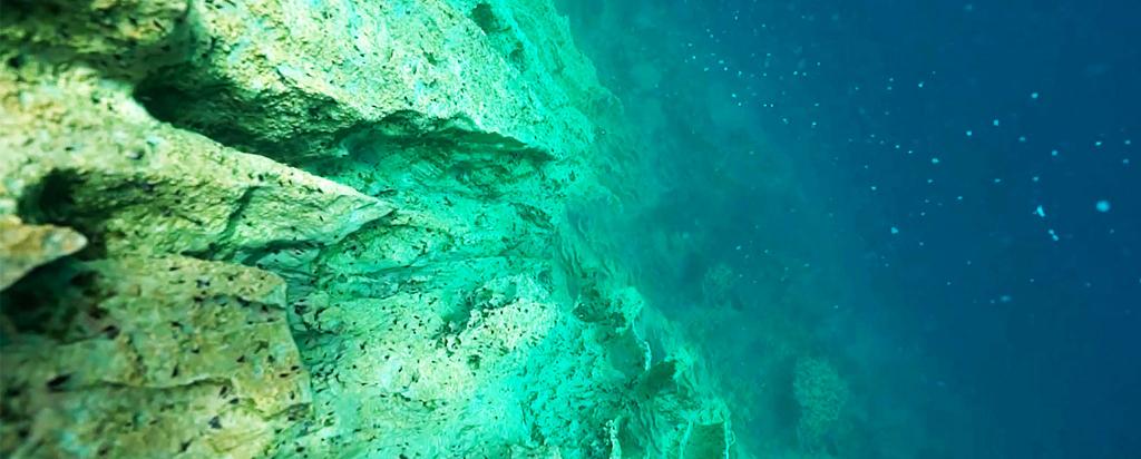 Limestone cliff under sea