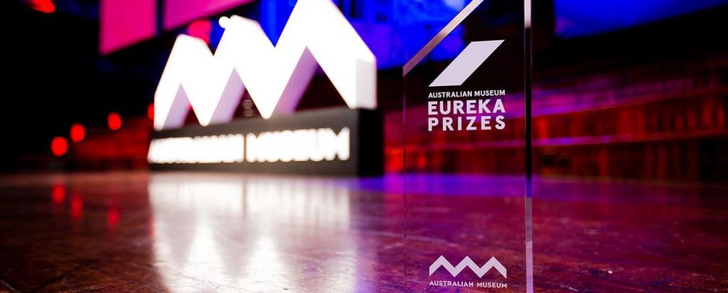 Photo of an award trophy on stage at event