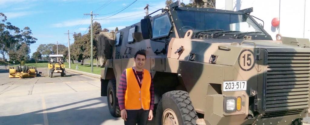 Michael Saleh with defence vehicle