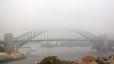 Sydney Harbour Bridge covered in haze