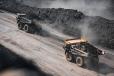 mining trucks creating dust