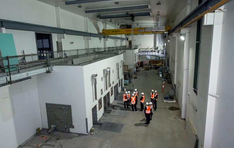 Special visitors inspect the facility under construction in 2017