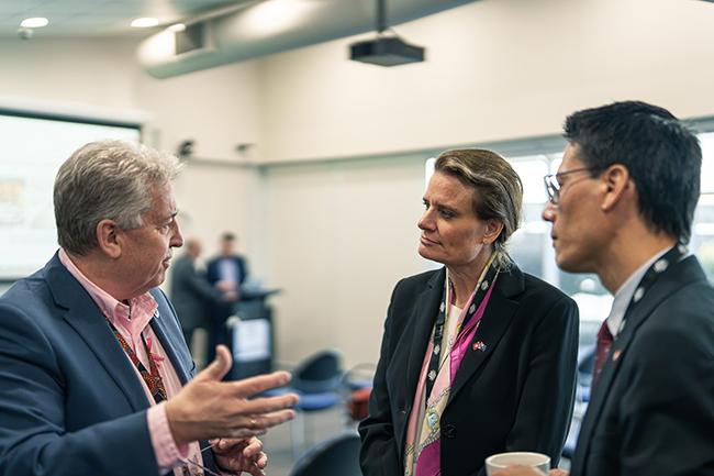 Shaun Jenkinson with Swiss officials.